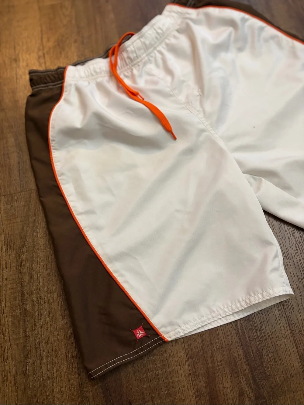 Old Navy White Swim Trunks with Brown Panels and Orange Trim